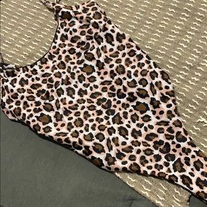 High leg one piece
